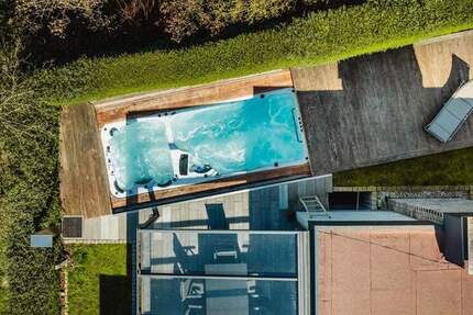 Wohnen wie im Urlaub: Exklusiver Bungalow mit eigenem Spa-Bereich im Grünen 4 zimmer