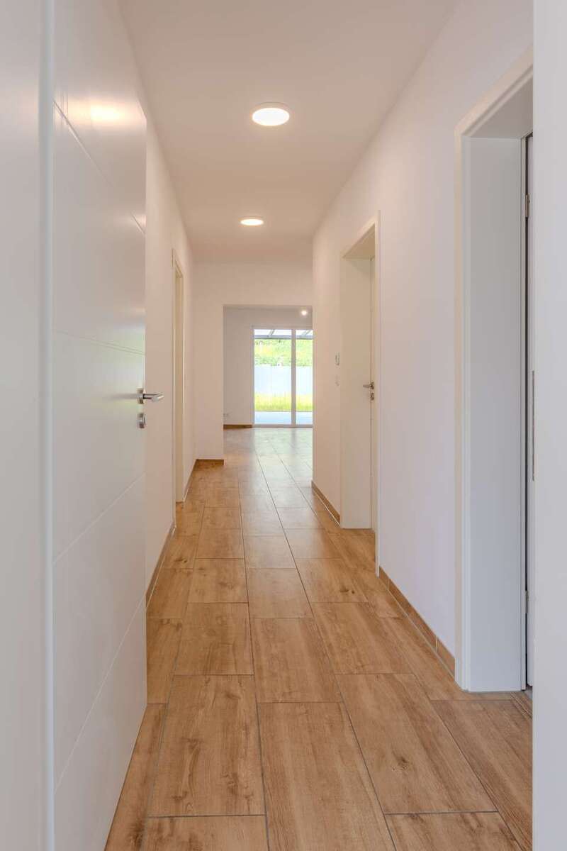 Neuwertiges Mehrfamilienhaus in Hamm-Heessen: 3 Einheiten, Gewerbefläche & privater Garten 9 zimmer