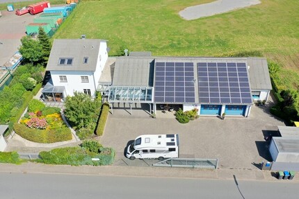 Großzügiges Wohnen und Arbeiten vereint: Einfamilienhaus mit Gewerbeeinheit! 10 zimmer