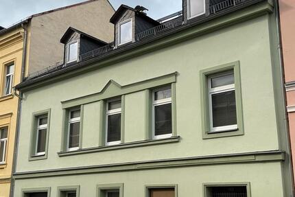Mehrfamilienhaus mit Gewerbefläche direkt am Marktplatz