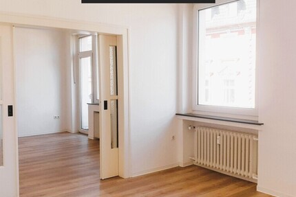 Zentral gelegene charmante Drei-Zimmer-Wohnung mit Balkon