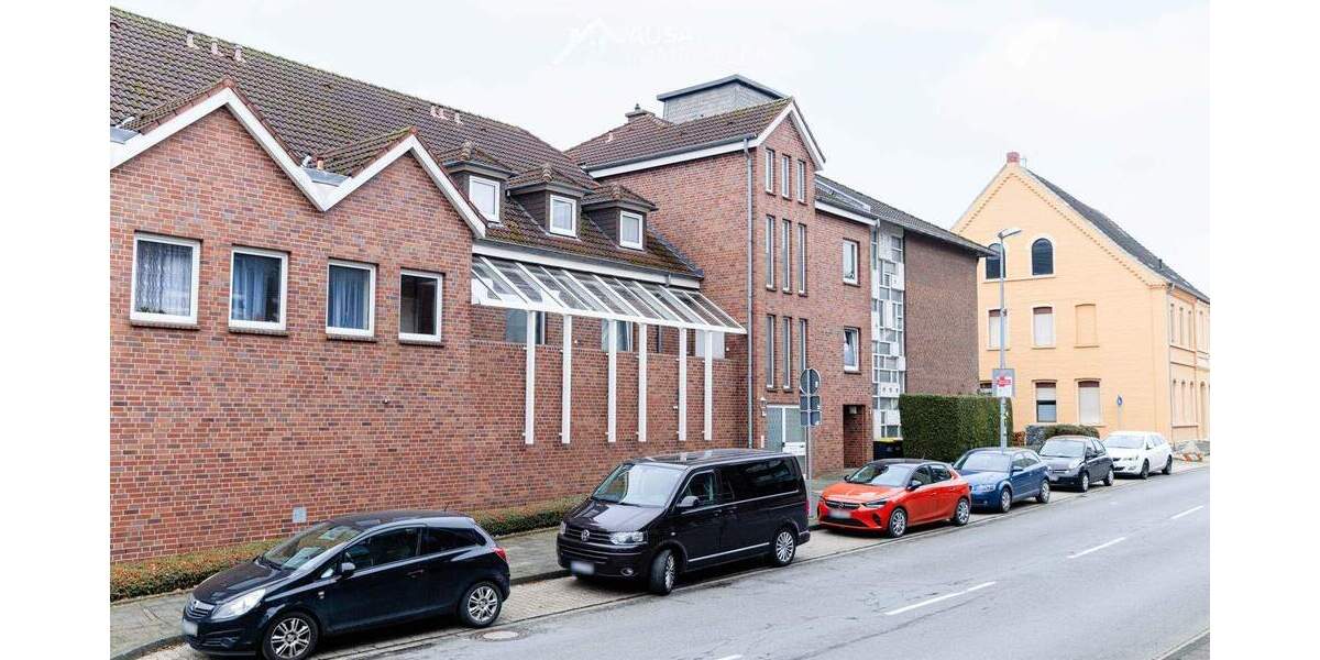 Ertragsstarkes Mehrfamilienhaus mit 16 Wohneinheiten + Fitnessstudio + 45 Stellplätze zimmer