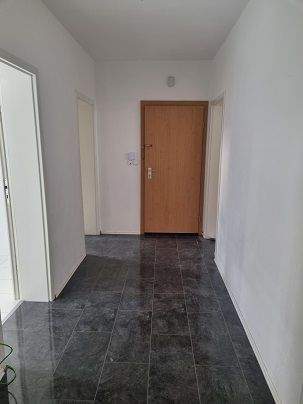 Menden Lendringsen – Renovierte Wohnung im 1.OG eines 5 FMH mit Südbalkon 3 zimmer