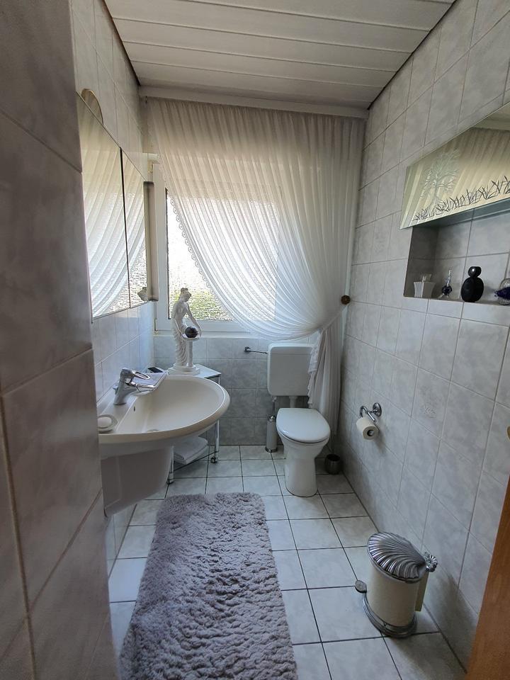 Doppelhaushälfte mit EinliegerWohnung, Teichgarten & Wintergarten
