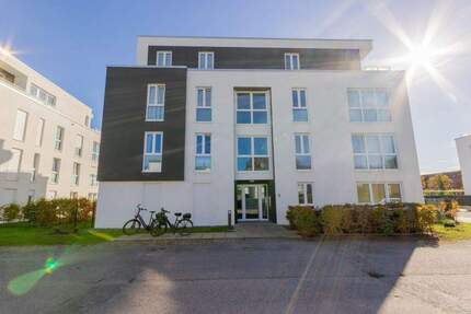 Erdgeschosswohnung mit Terrasse, Garten, Außen- und Tiefgaragenstellplatz 3 zimmer