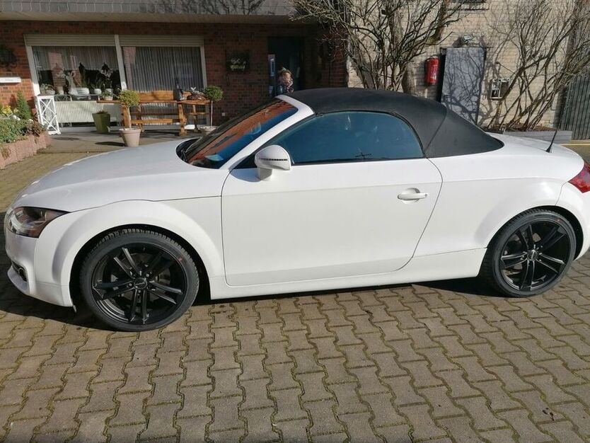 TT