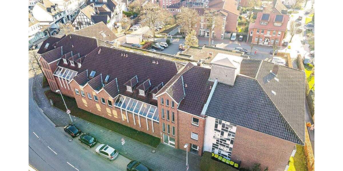 Ertragsstarkes Mehrfamilienhaus mit 16 Wohneinheiten + Fitnessstudio + 45 Stellplätze zimmer